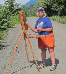 Donna painting in the middle of the road