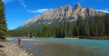 Jai at Bow River and Castle Mountain beyond